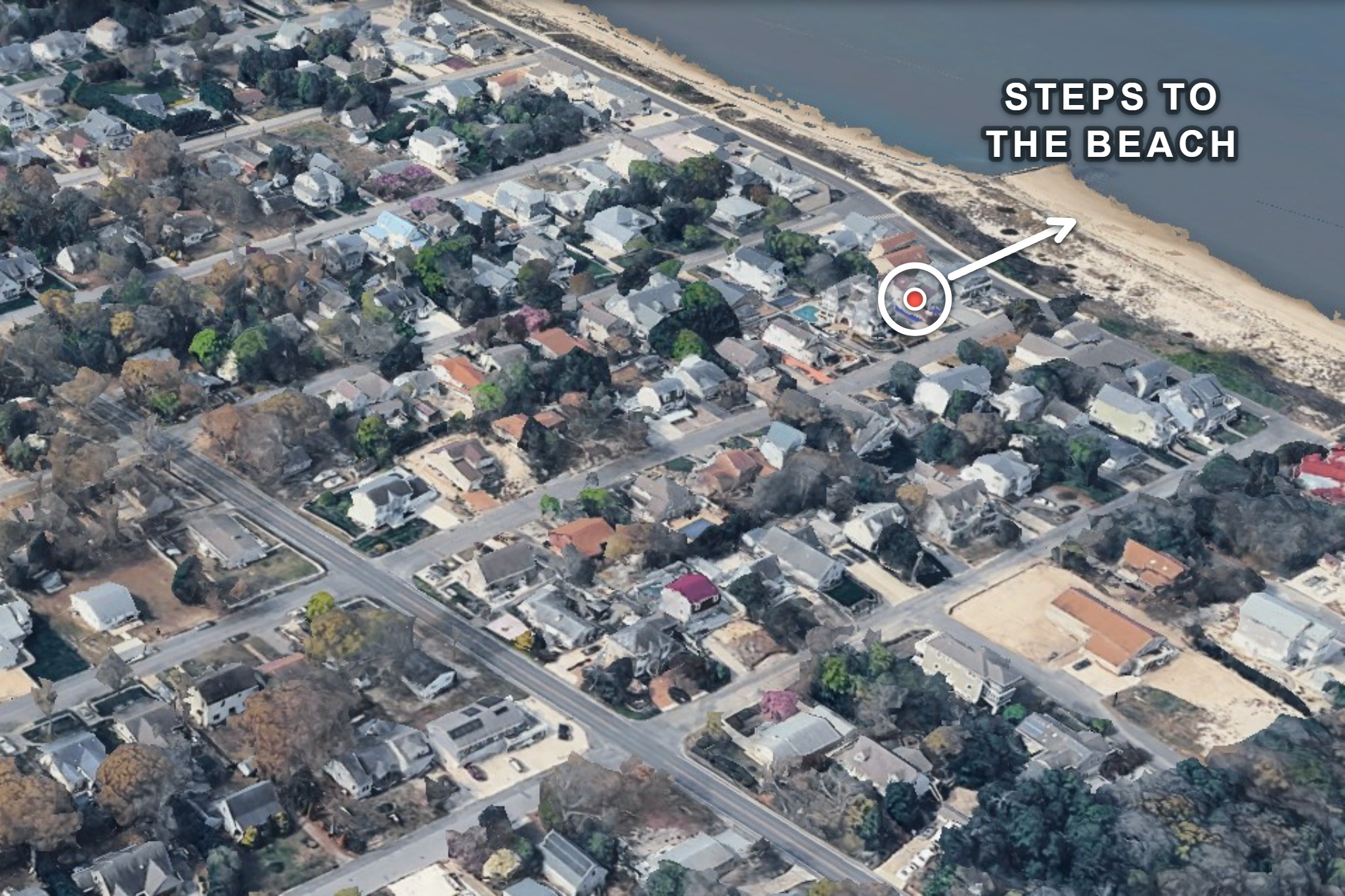 Aerial view showing Bayside Blessings just steps from the beach