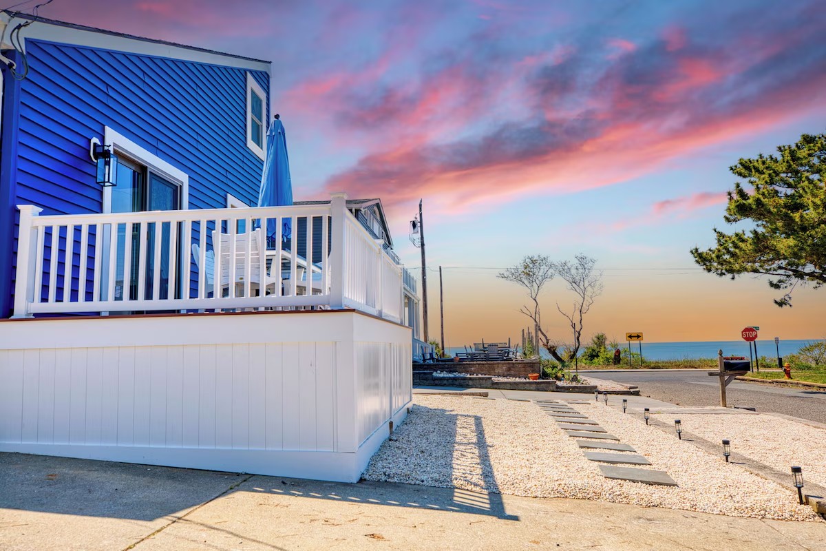 Bayside Blessings beach house at sunset overlooking the Delaware Bay